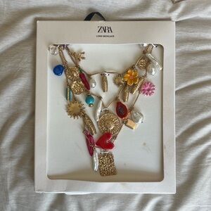 Zara Vibrant Charm Necklace with Gold and Red Accents